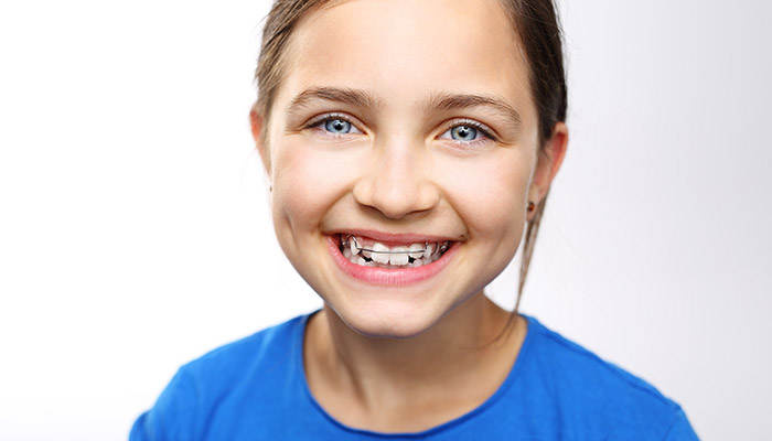 Smiling Young Girl Wearing Retainer